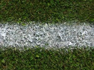 A chalk line on a grass pitch